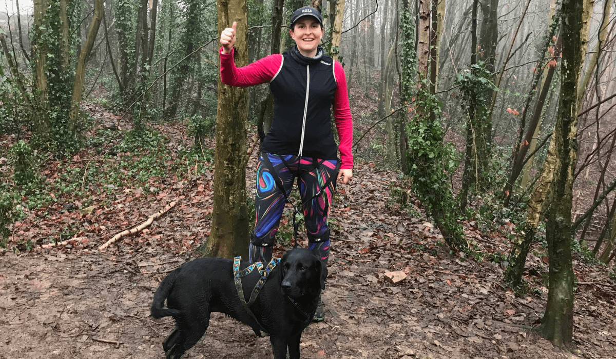 Runner, Nicola and her borrowed dog, Lola, a black Labrador Retriever