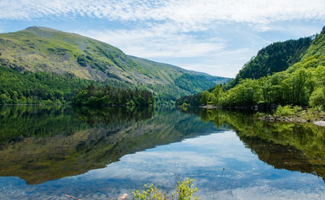 Thirlmere Lake on a very still day, the water looks like glass